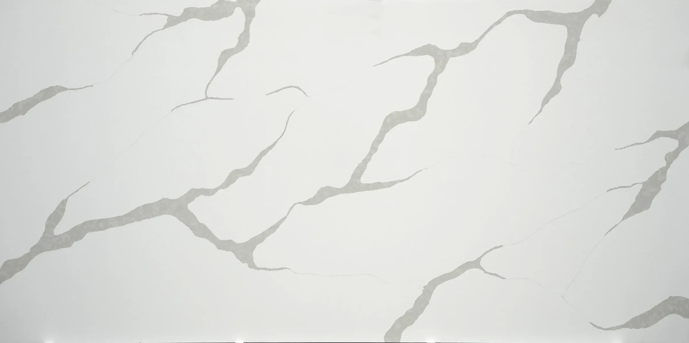 Full slab of Auro Quartz Calacatta 6653 quartz with wide grey veins